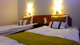 Отель Hotel Jollas89 Хельсинки Стандартный двухместный номер с 2 отдельными кроватями и видом на сад-1